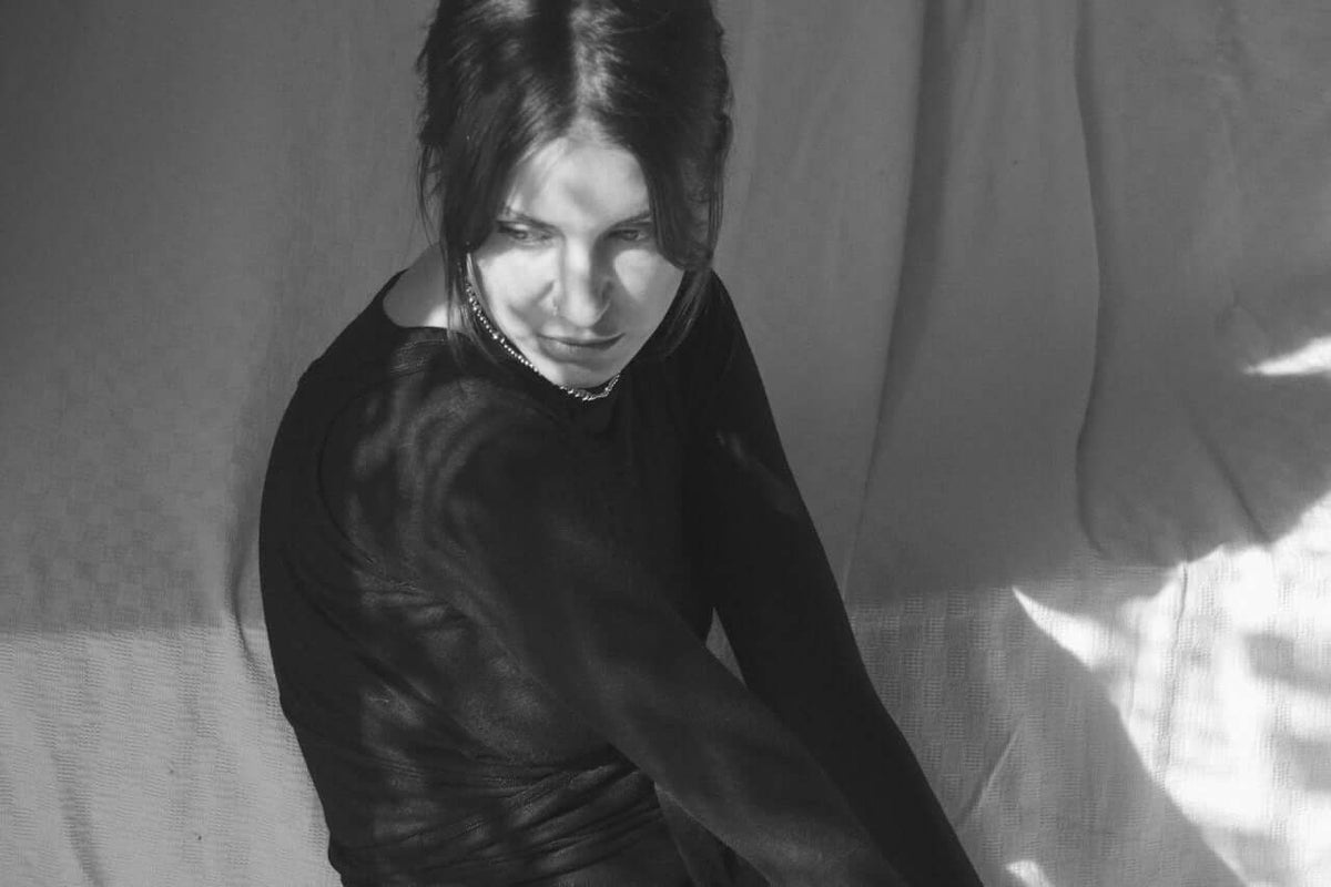 Sødalen merino wool long-sleeve top — black