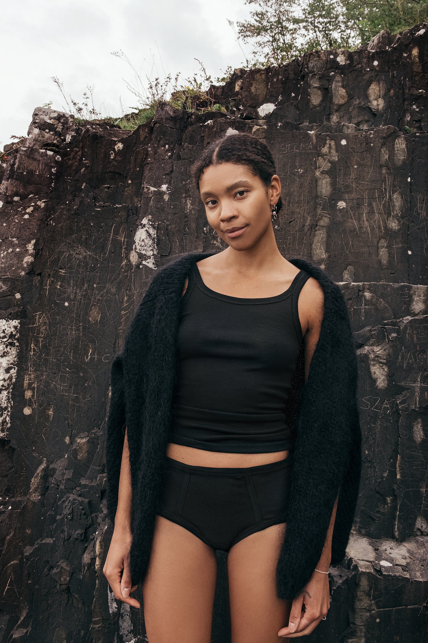 Merino wool panties on a model showcasing comfort and style in a natural setting.